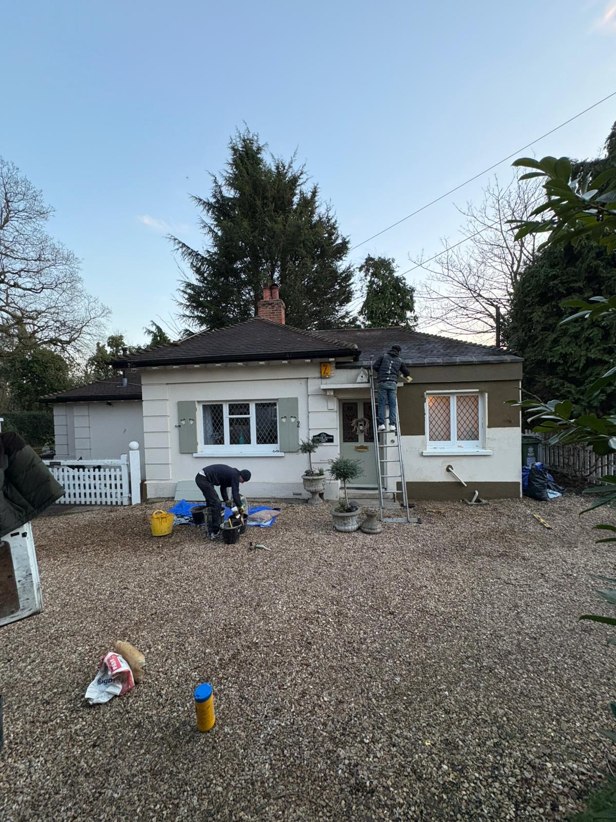 The team at work on a bungalow’s render